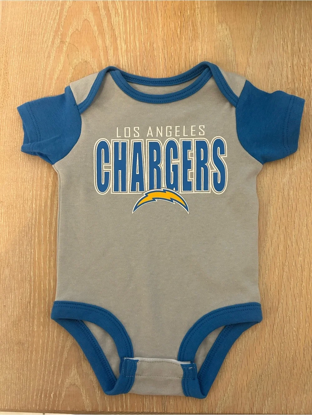 NFL Los Angeles Chargers Gray and Blue Baby One-Piece with Yellow Bolt